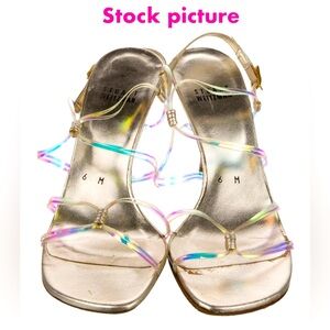 Stylish Stuart Weitzman strappy sandals, gently worn, almost nude clear tone.